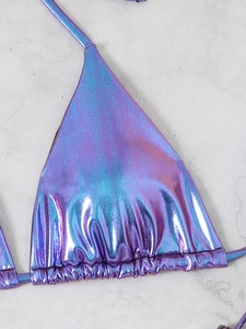 Detail of holographic purple halter bikini top with metallic shine and ruched texture