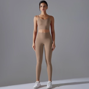 Front view of a taupe two-piece yoga set featuring a camisole top and high-waisted leggings