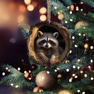 Detail of 2D acrylic raccoon hanging from a tree hole on a Christmas tree with warm lights