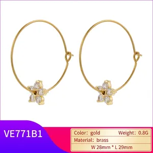 Gold plated brass star flower earrings with micro-pave cubic zirconia 28x29mm