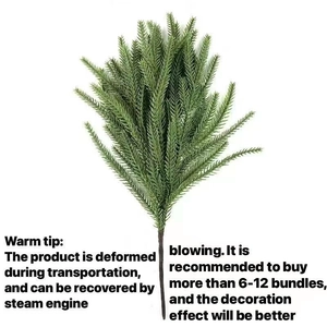 Detailed view of artificial Norfolk pine needles with soft touch texture for holiday decor
