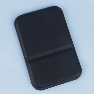 Detail view of the black PU leather folding vanity mirror with lychee texture surface