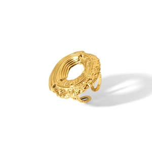 Irregular hollow gold-plated ring with organic lava texture and adjustable opening