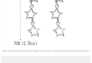 Detail showing hollow star drop earrings in silver tone measuring 7cm in length