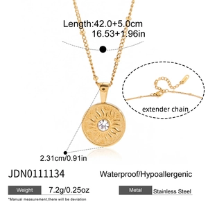 Detail of gold stainless steel sun pendant with white stone and 42cm chain measurements