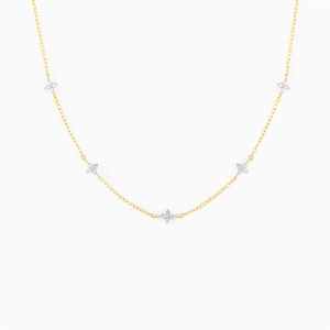 Minimalist gold-plated necklace featuring five light blue four-petal flower charms on a thin chain
