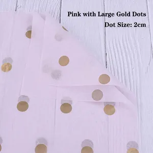 Pink tissue paper with 2cm gold foil polka dots for bouquet and gift wrapping detail