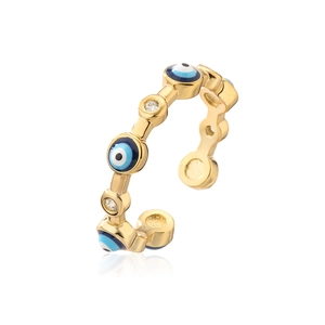 Detail of gold evil eye open ring featuring blue enamel beads and sparkling zircons