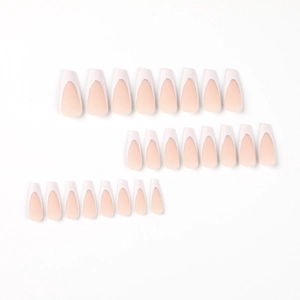 French tip coffin nails with nude gradient, white edges and silver glitter details