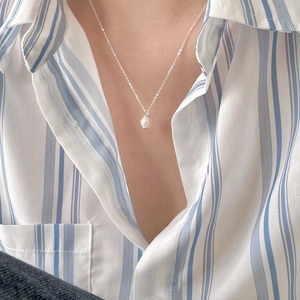 Elegant 925 sterling silver necklace with a single white pearl on a delicate silver chain