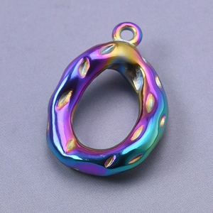 Macro view of rainbow-plated 304 stainless steel teardrop pendant with textured surface