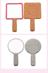 Detail of square and round handheld mirrors featuring vibrant pink and silver rhinestones