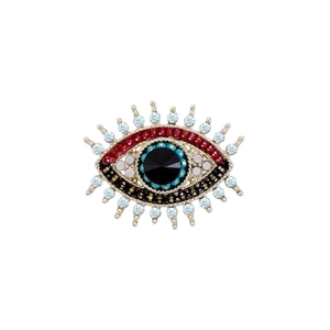 Retro Evil Eye brooch in gold alloy with vibrant rhinestones and black center stone