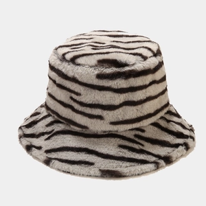 Detail of soft black and white zebra pattern faux fur on a thick winter bucket hat