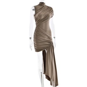 Detail of a brown ruched dress showing the high collar and asymmetrical drape