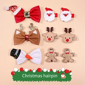 Detailed set of 9 Christmas hair clips featuring faux leather bows and festive motifs