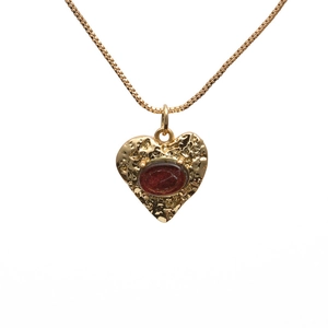 Vintage golden heart pendant necklace with hammered texture and red crystal stone