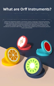 Close-up of wooden fruit castanets including apple, orange, watermelon and kiwi designs