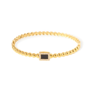 Elegant gold beaded bracelet featuring a black square stone and sparkling rhinestones
