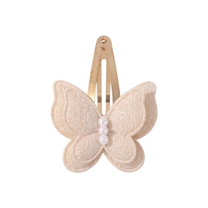 Detailed view of handmade double-layer lace butterfly hair clip with pearl accents