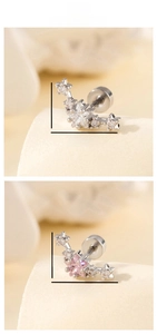 Detailed view of curved star zircon stud earrings with flat back screw in silver finish