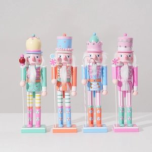 Detail of four colorful 30cm wooden nutcracker soldiers in sweet macaron pastel shades