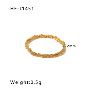 Detailed view of 2mm 18K gold plated braided ring showing weight and texture info