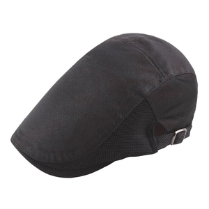 Detail of breathable black mesh fabric and adjustable metal buckle on newsboy cap