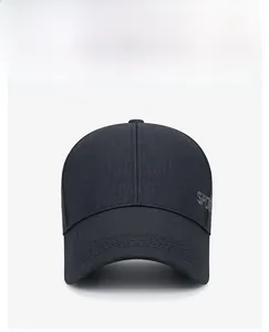 Detail of sports baseball cap featuring side embroidery and curved long brim texture