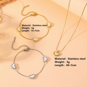 Stainless steel shell heart pendant necklace and bracelet set in gold and silver finish
