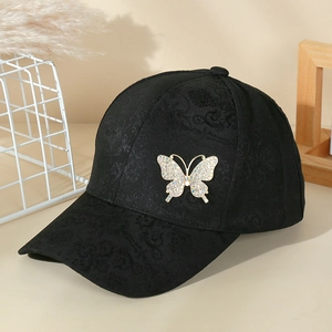 Women's black baseball cap with rhinestone butterfly and floral jacquard pattern