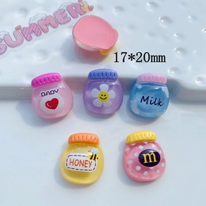 Detail of 17x20mm colorful resin milk bottle charms with BABY and Milk lettering