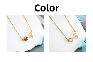 Detail of tulip necklaces with purple and white zircon stones on stone display