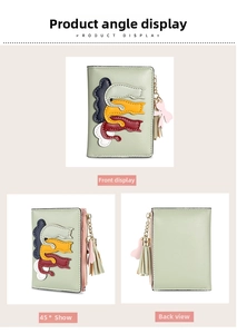 Detailed view of light green short wallet with cat pattern, tassel and bow charm