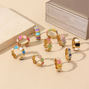 Colorful floral and striped enamel rings with 18k gold plating in a summer layout