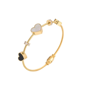 Titanium steel heart bangle with micro-paved cubic zirconia and gold finish