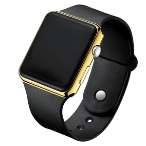Detail view of the sleek gold square case and black silicone strap on this digital watch
