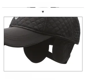Close-up of quilted winter baseball cap with foldable ear flaps for cold protection