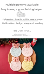 Detail of Christmas fondant cookie molds showing reindeer and cottage patterns