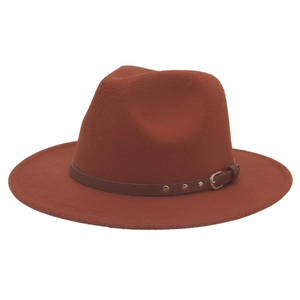 Detail of red-brown wool fedora with brown leather belt, gold buckle and metal rivets