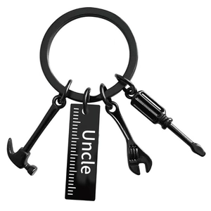Matte black stainless steel tool keychain with hammer and uncle engraved ruler