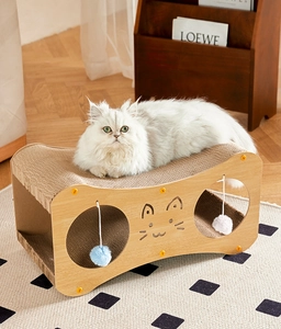 Detail view of the durable wavy corrugated scratch pad on a dual-layer wooden cat house