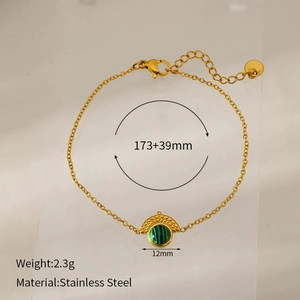 Detail view of gold-plated stainless steel bracelet with 12mm green malachite pendant charm