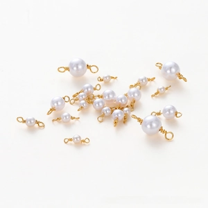 Detailed view of 18K gold plated pearl connectors for DIY jewelry making and bracelets