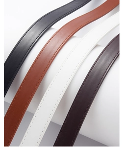 Detail of four colorful PU leather children's belts featuring premium stitching and pin buckle