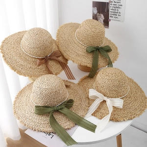 Cappello da sole in rafia da donna con fiocco e perle per le vacanze estive al mare