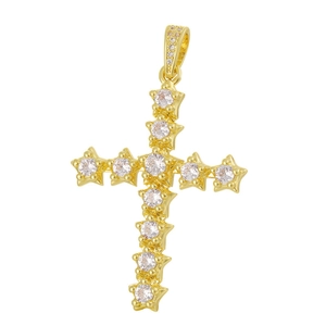 Detailed view of a gold-plated copper cross pendant inlaid with clear zircon crystals