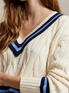 Classic V-neck cable knit sweater in cream with contrast navy blue striped trim