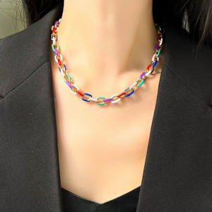 Colorful enamel chain necklace in gold-tone stainless steel worn by a model