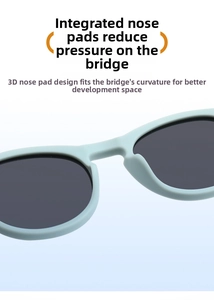 Detail view of mint green silicone sunglasses with integrated comfortable nose bridge